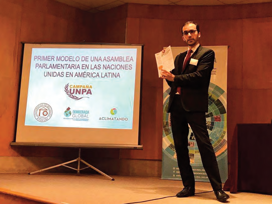 A speaker presents the first model UN Parliamentary Assembly session for Latin America