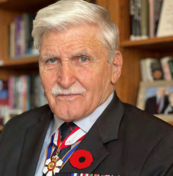 Romeo Dallaire wearing his service medals and a remembrance poppy