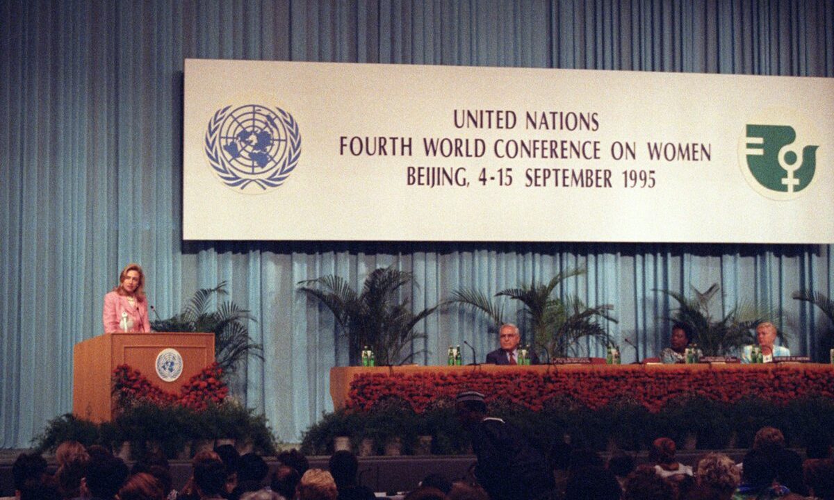 The opening of the Fourth World Conference on Women in Beijing, 1995, with the official UN conference banner, the very event whose 25th anniversary and Platform for Action the article looks toward.