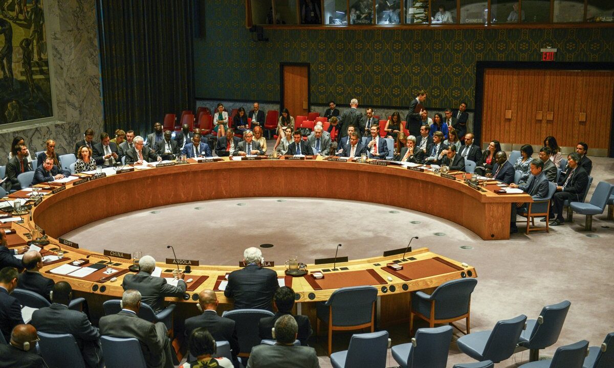 The United Nations Security Council in session around its horseshoe table, the body that authorizes Responsibility to Protect action and debates atrocity prevention.