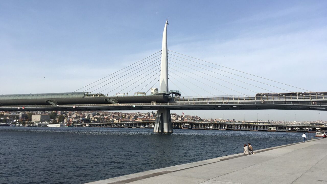 A cable stayed bridge crossing a wide waterway.