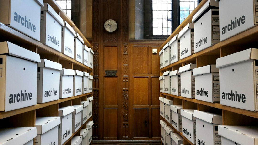 A room filled with archival boxes, indicating a place where historical records are stored and organized.