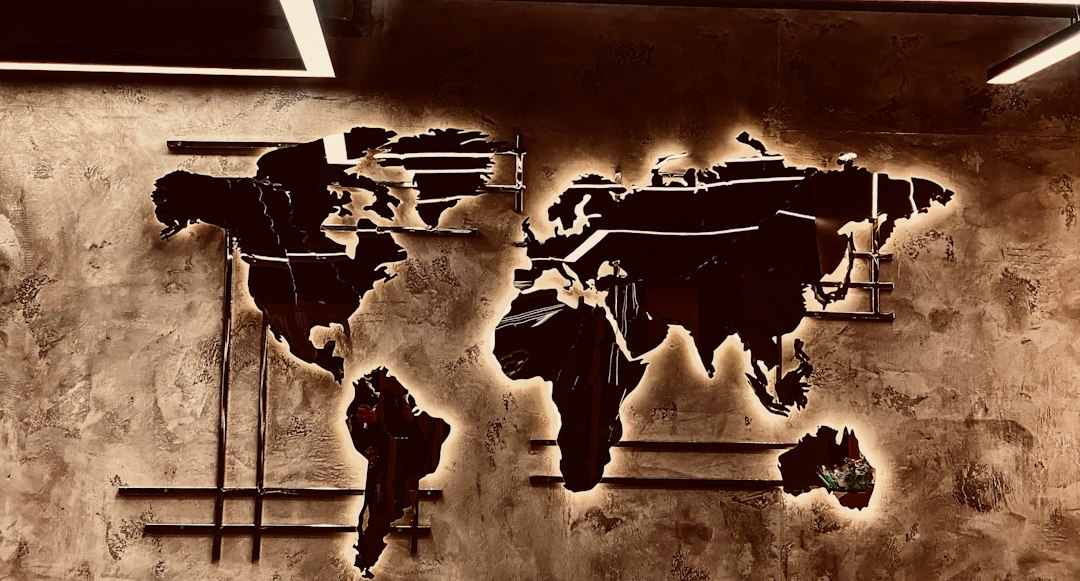A wall-mounted globe showing the world's continents.